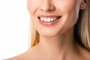 partial view of smiling woman